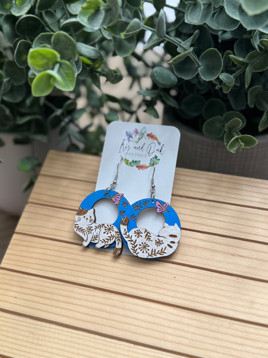 Cats Chasing Butterflies